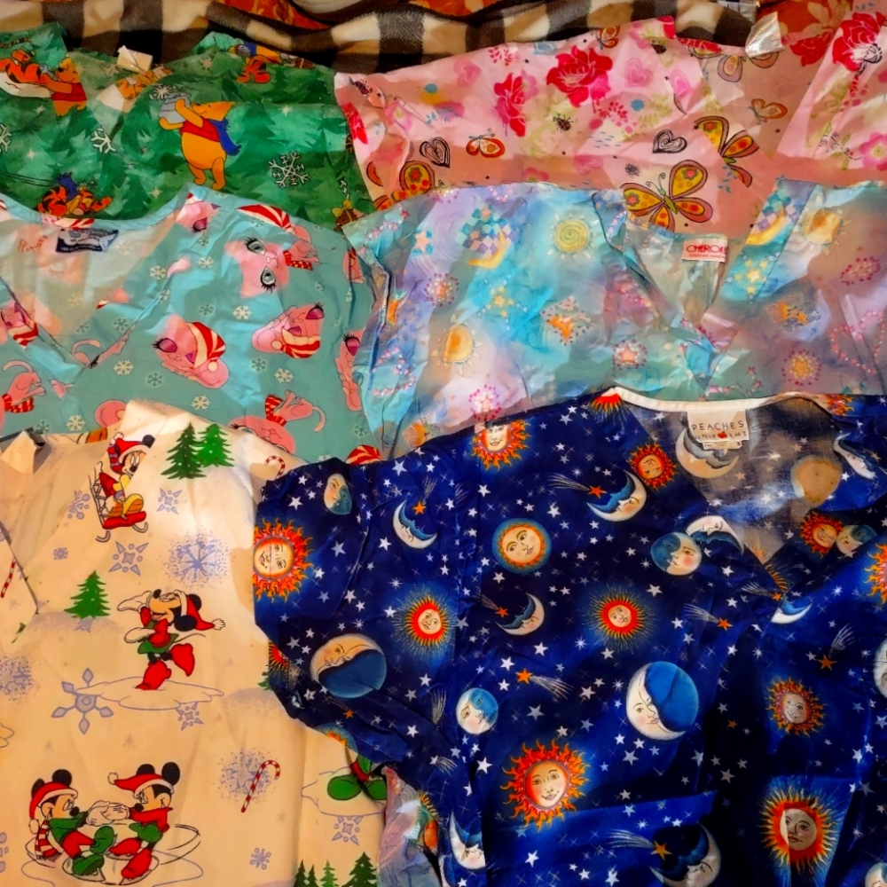 21 items in lot Gently used scrubs extra large